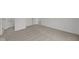 The carpeted basement showcases an open layout and visible doorways at 10138 Redwood Peak Ln, Indianapolis, IN 46259