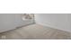 A bright bedroom shows neutral carpet, a window and crisp white trim at 10138 Redwood Peak Ln, Indianapolis, IN 46259