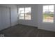 Bedroom featuring carpet, a closet, and two windows at 10138 Redwood Peak Ln, Indianapolis, IN 46259