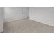 A bright bedroom with neutral carpet and white walls, offering a calm, minimalist aesthetic at 10138 Redwood Peak Ln, Indianapolis, IN 46259