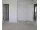 Empty room with 3 doors, ready for customization, offering a flexible and adaptable space to personalize at 10138 Redwood Peak Ln, Indianapolis, IN 46259