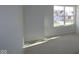 Sunlit bedroom featuring a large window, providing a bright and inviting space for relaxation at 10138 Redwood Peak Ln, Indianapolis, IN 46259