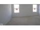 Well-lit bedroom with two windows and neutral walls, ready for your personal touches and design ideas at 10138 Redwood Peak Ln, Indianapolis, IN 46259