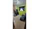 View of a furnished bedroom with green walls and carpeted floor at 1029 Price Rd, Avon, IN 46123