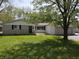 Charming front yard with green grass in front of a ranch-style home at 1029 Price Rd, Avon, IN 46123