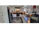 Well-lit kitchen featuring white cabinetry, stainless steel appliances, and mosaic backsplash at 1029 Price Rd, Avon, IN 46123