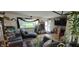 Inviting living room with plants, hardwood floors, and a large window offering lots of natural light at 1029 Price Rd, Avon, IN 46123
