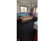 Living room with a comfortable sofa and wooden accents at 1029 Price Rd, Avon, IN 46123