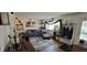 Bright living room featuring hardwood floors, neutral paint, stylish decor and lots of natural light at 1029 Price Rd, Avon, IN 46123