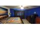 Comfortable main bedroom with colorful quilt, fan, and ample closet space at 1029 Price Rd, Avon, IN 46123