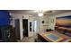 Spacious main bedroom featuring closet, colorful quilt, and bright accents at 1029 Price Rd, Avon, IN 46123