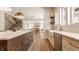 Bright, spacious kitchen with a large island, stainless steel appliances, and white marble countertops at 10415 Westfield Blvd, Carmel, IN 46280