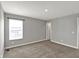 Bedroom features neutral paint, carpet, and trim at 10423 Hamburg Dr, Fortville, IN 46040