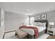 Cozy bedroom features neutral paint, carpet, and furnishings at 10423 Hamburg Dr, Fortville, IN 46040