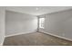 Bedroom with neutral paint and carpet. Plenty of natural light from the window at 10423 Hamburg Dr, Fortville, IN 46040
