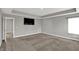 This bedroom features a tray ceiling, natural light, and is wired for tv at 10423 Hamburg Dr, Fortville, IN 46040