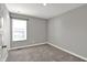 Bedroom with neutral paint and carpet. Plenty of natural light from the window at 10423 Hamburg Dr, Fortville, IN 46040