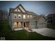 Beautifully designed two-story home with well-maintained landscaping at 10423 Hamburg Dr, Fortville, IN 46040