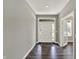 Inviting foyer with hardwood floors and natural light at 10423 Hamburg Dr, Fortville, IN 46040
