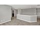 Spacious loft with neutral paint, plush carpeting, and white trim at 10423 Hamburg Dr, Fortville, IN 46040