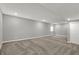 Large room with neutral carpet at 10423 Hamburg Dr, Fortville, IN 46040
