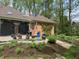 Beautiful brick house featuring a patio, screened porch and professionally landscaped backyard at 10561 Wilson Rd, Brownsburg, IN 46112