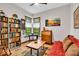 Cozy living room with hardwood floors, built in shelves, and natural light at 10561 Wilson Rd, Brownsburg, IN 46112