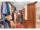 Walk-in closet with custom shelving provides plenty of storage space at 10561 Wilson Rd, Brownsburg, IN 46112