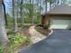 Landscaped front yard with a stone path leading to the attached garage at 10561 Wilson Rd, Brownsburg, IN 46112