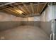 Unfinished basement with concrete floor, exposed ceiling, and framed walls, awaiting personalized design at 1114 Ridgevine Rd, Greenwood, IN 46143
