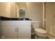 Clean bathroom with granite countertops, a toilet, and a shower at 1114 Ridgevine Rd, Greenwood, IN 46143