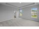 Bright bedroom featuring plush carpeting, large windows, and neutral paint at 1114 Ridgevine Rd, Greenwood, IN 46143