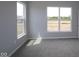 Bedroom with hardwood floors, neutral color, and lots of natural light at 1114 Ridgevine Rd, Greenwood, IN 46143