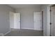 This spacious bedroom features access to two closets and an adjoining bathroom at 1114 Ridgevine Rd, Greenwood, IN 46143