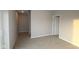 Comfortable bedroom with neutral walls, plush carpeting, and a hallway entrance at 1114 Ridgevine Rd, Greenwood, IN 46143