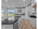 Modern kitchen with stainless steel appliances, granite countertops, and ample cabinet space at 1114 Ridgevine Rd, Greenwood, IN 46143