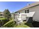 Well-maintained back deck overlooking lush green lawn and peaceful pond at 11862 Stoney Bay Cir, Carmel, IN 46033
