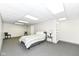 Basement bedroom featuring neutral carpet, recessed lighting, and modern minimalist decor at 11862 Stoney Bay Cir, Carmel, IN 46033