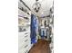 Spacious walk-in closet with custom shelving and ample hanging space at 11862 Stoney Bay Cir, Carmel, IN 46033