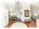 Grand entrance foyer with dark hardwood floors that leads to the dining room and living room at 11862 Stoney Bay Cir, Carmel, IN 46033