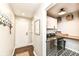 Convenient laundry room with washer, dryer, cabinets, and storage space at 11862 Stoney Bay Cir, Carmel, IN 46033