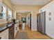 Bright kitchen with hardwood floors, view to dining and living room at 125 W Noble St, Lebanon, IN 46052