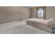 Neutral bedroom featuring carpeted floors and a window letting in natural light at 12867 Andover Dr, Carmel, IN 46033