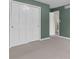 Bedroom with carpeted floors, a closet, and a window at 12867 Andover Dr, Carmel, IN 46033