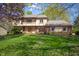 Charming two-story home with a well-manicured lawn and inviting curb appeal at 12867 Andover Dr, Carmel, IN 46033