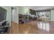 Bright living room with fireplace, built-in shelving, and hardwood floors at 12867 Andover Dr, Carmel, IN 46033