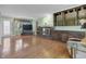 Cozy living room with fireplace, hardwood floors, and ample natural light at 12867 Andover Dr, Carmel, IN 46033