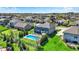 Aerial view of blue house featuring fenced backyard with beautiful in-ground pool at 13836 Fieldcrest Dr, McCordsville, IN 46055