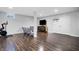 Open basement featuring a dark stained floor and a fitness area at 13836 Fieldcrest Dr, McCordsville, IN 46055