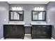 Modern bathroom features dual sinks, marble countertops, and sleek design at 13836 Fieldcrest Dr, McCordsville, IN 46055